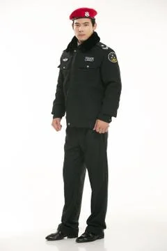 Create all kinds of work clothes policeman stands in front of a white background Stock Photos