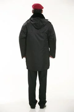 Create all kinds of work clothes policeman stands in front of a white background Stock Photos