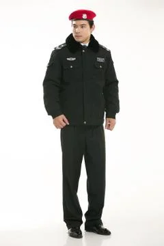 Create all kinds of work clothes policeman stands in front of a white background Stock Photos