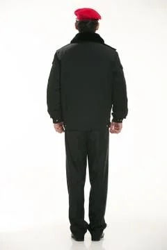 Create all kinds of work clothes policeman stands in front of a white background Stock Photos