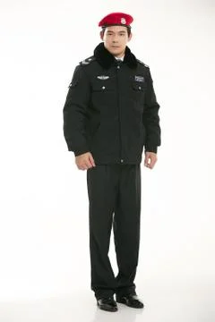 Create all kinds of work clothes policeman stands in front of a white background Stock Photos