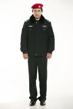 Create all kinds of work clothes policeman stands in front of a white background Stock Photos