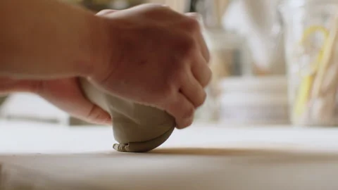 Create beautiful pottery with expert hands shaping ceramic clay Stock Footage 321540097