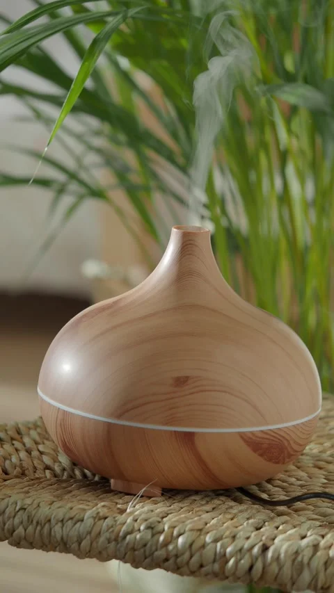 Create a calming atmosphere with an essential oil diffuser Stock Footage 316109024