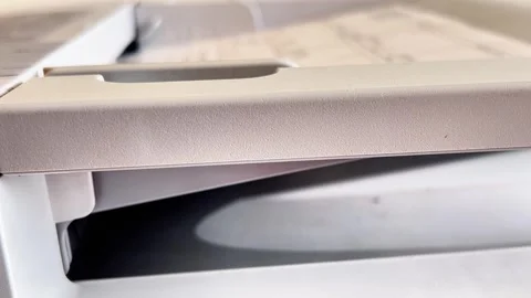 To create a copy of the documents, they are put in a bundle in a printer an.. Stock Footage 317453455