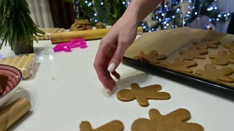 Create delightful gingerbread men for a magical Christmas celebration Stock Footage 344819663