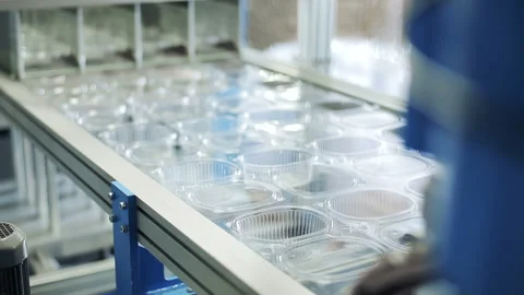 Create one-off package and pack. Goods manufactured of plastic packing from envi Video stock 199487346