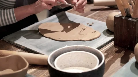 Create of part of the ceramic bowl in pottery workshop table Stock Footage 201568488