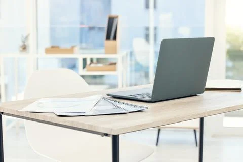 Create the perfect workspace for you. an empty office with a laptop on the table 스톡 사진
