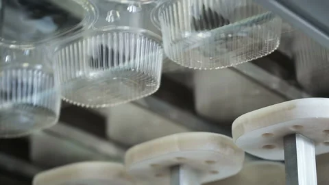 Create plastic package and pack. Goods manufactured of plastic packing from envi Video stock 199487300