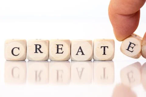 Create, spelled with dice letters Stock Photos