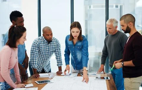 Create the things you wish existed. a group of architects in the boardroom. Stock Photos