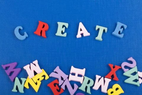 CREATE word on blue background composed from colorful abc alphabet block wo.. Foto stock