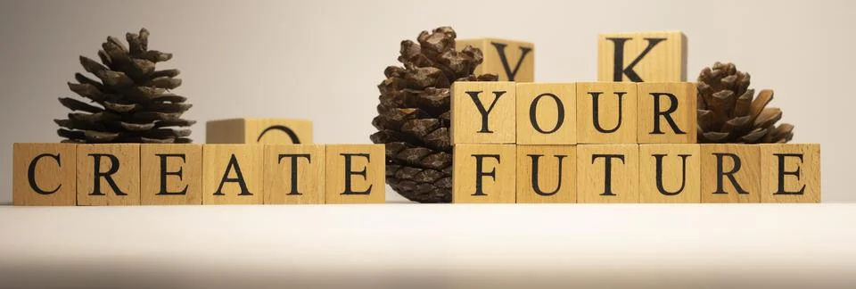Create your future word background on wooden blocks. close up Foto stock