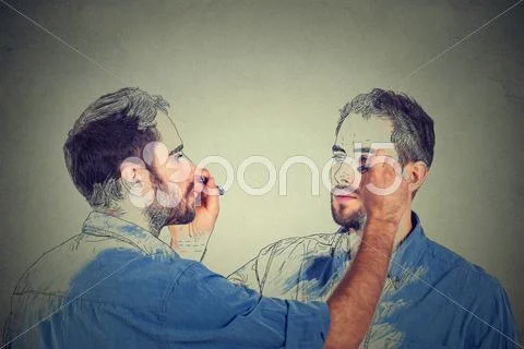 Create yourself concept. Good looking young man drawing a picture, sketch of Stock Photos