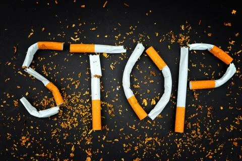 Created word STOP from cigarettes Stock Photos