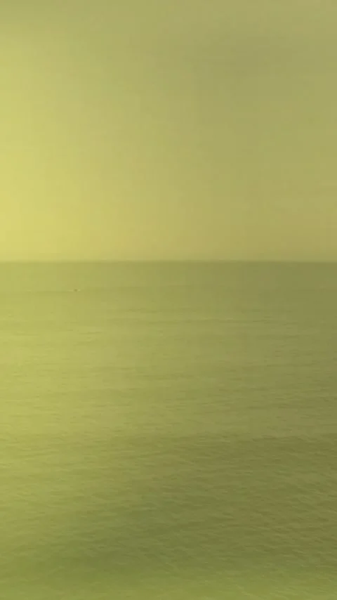 Creating abstract effect, ocean view with green, yellow, and pink animation Stock Footage 344370545