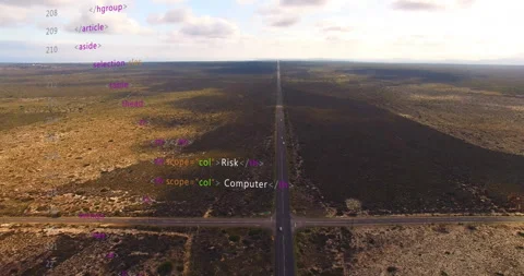 Creating animation, HTML code overlay on aerial road view through vast landscape Stock Footage 304840128