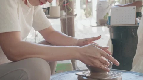 Creating Art on the Pottery Wheel Stock Footage 319414982