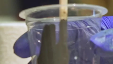 Creating Art With Texture and Depth Using Paint in Creative Containers Video stock 340594290