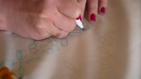 Creating Beautiful Hand-Drawn Designs With Markers on Fabric Stock Footage 280336824