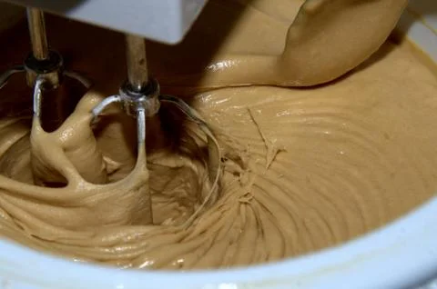 Creating a cake dough Stock Photos