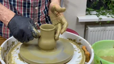 Creating a ceramic bowl in a pottery class. Stock Footage 314546340