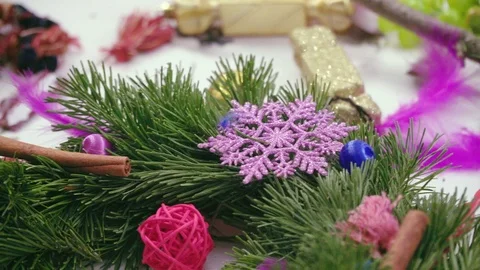 Creating a Christmas wreath with decorations. Close-up Video stock 70967151
