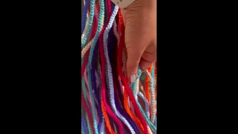 Creating Colorful Thread Dreadlocks: DIY Hair Tutorial. Vertical video. 스톡 동영상 326054850