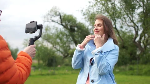 Creating content for a video blog. The model works in the frame in front of the Stock Footage 131740158