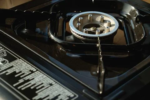Creating culinary magic with a modern gas stove burner in a cozy kitchen Stock Photos