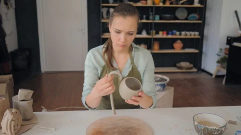 Creating cup of white clay Stock Footage 119544525