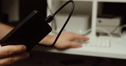 Creating Data Backup on External Hard Drive Stock Footage 332072966