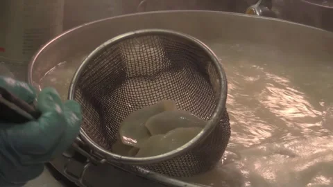 Creating delicate dumplings in a warm kitchen Stock Footage 323793464
