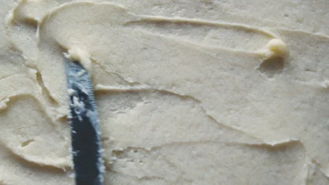 Creating delicate layers for flaky pastry texture.  Stock Footage 331851077
