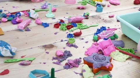Creating different figures plasticine by children. Creative mess on table Видео 244980317