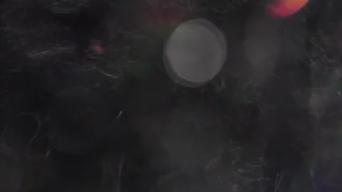Creating diffuse light leaks, white crushed bokeh and colored bokeh in video Stock Footage 317538950