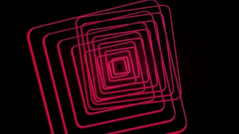 Creating dynamic VJ loops with vibrant neon visuals in a dark setting Video stock 292095322