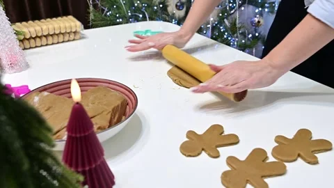 Creating festive gingerbread delights with a magical touch during Christmas time Video stock 344820823