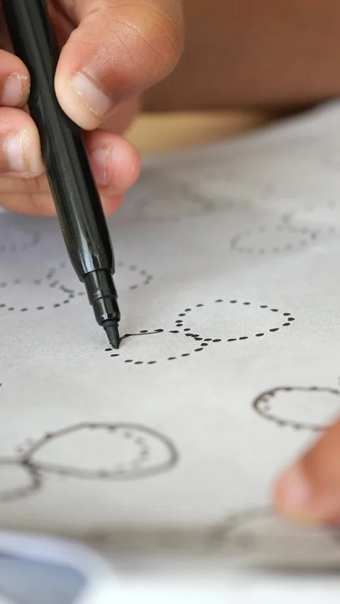Creating fun patterns with a marker on paper Stock Footage 321438651