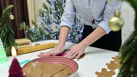 Creating gingerbread shapes with beautiful hands at Christmas time Stock Footage 344821900