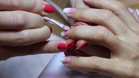 Creating a gradient with a brush on female nails. Stock Footage 111392106