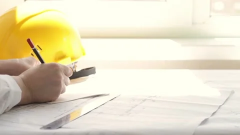 Creating an interior design by an architect engineer on the blueprints on the Stock Footage 201434709