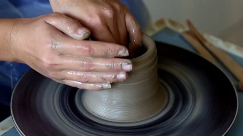 Creating jar or vase of clay. Woman hands, potter's wheel Stock Footage 78142556