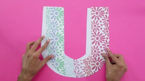 Creating letters with decorated cardboard Stock Footage 285586619