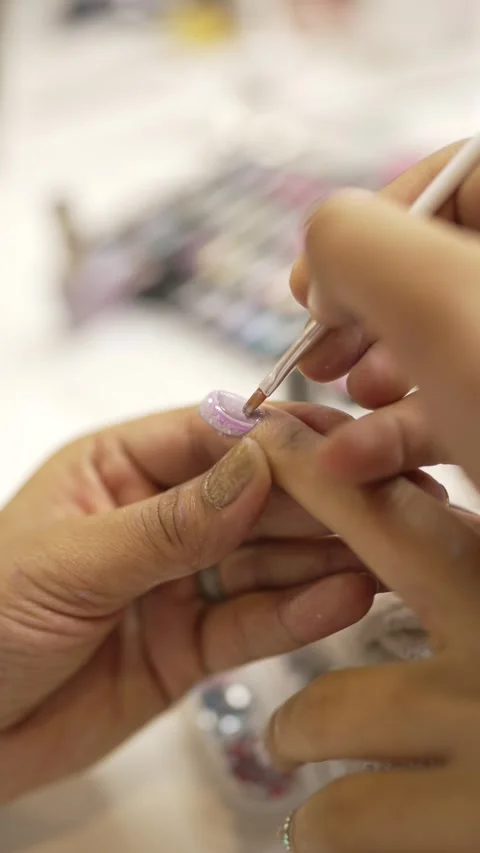 Creating Nail Art Designs Stock Footage 312990976