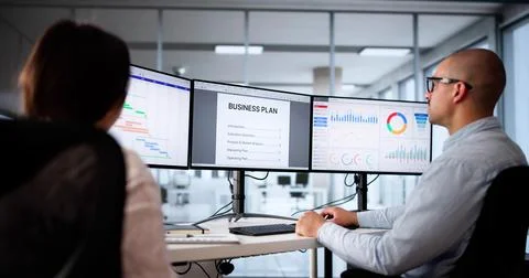 Creating A New Business Plan Document On The Computer Screen. The Entrepreneu Stock Photos