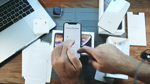 Creating passcode after unboxing new iPhone by Apple Computers Video stock 155129618