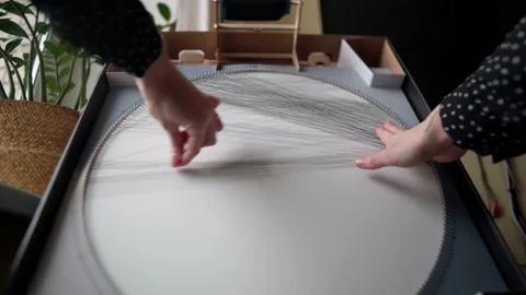 Creating a pattern from threads Stock Footage 169625224