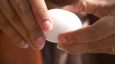 Creating a perfect hard boiled egg with simple steps Stock Footage 309669075